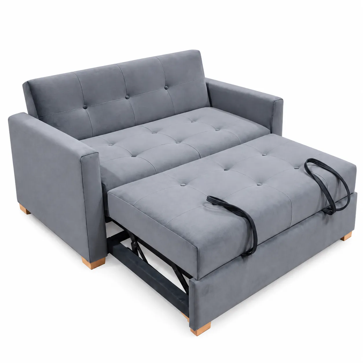 Grey buttoned sofa bed with the pull-out section extended and lifting straps visible